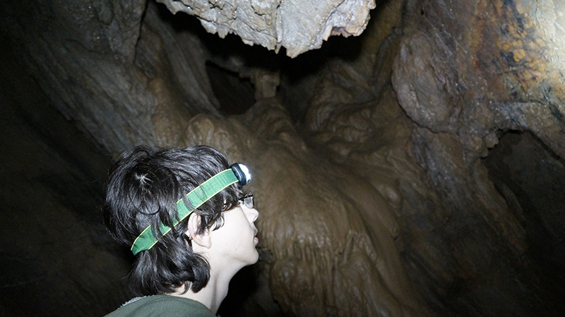 Arthur exploring a cave