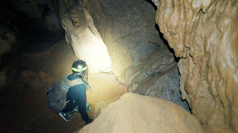 Arthur exploring a cave