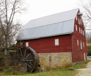 Stone and red wood mill.